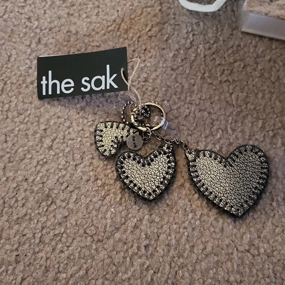The sak leather triple dark silver hearts Keychain 💕 tagged gorgeous bag
